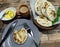 A close up of a basket of Baati roti for breakfast