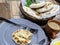 A close up of a basket of Baati roti for breakfast