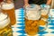 Close-up of bavarian beer glasses 1 liter Beer on table decoation at the Octoberfest