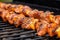 close-up of bbq spiced shrimp skewers on a grill