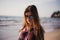 Close up beach portrait of cheerful blonde hipster. Wild girl on summer beach with sunglasses, hipster girl style