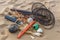 close-up of beach trash, including broken glass and discarded fishing gear