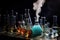 close-up of beakers, flasks and test tubes with steam rising from boiling liquids