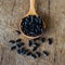 Close up bean seed spoon on wood