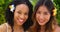 Close up of Beautiful African American and Asian women on vacation together