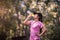 Close-up of beautiful asian woman sport athletes drinking water with electrolytes after exercise. Asian woman dehydrated sweating