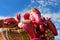 Close Up Beautiful Big Pink colors of Hindu god lord Ganesha with white cloud and blue sky background