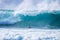 Close up of beautiful and bigs blue and green waves breaking - pacific or athlantic ocean - blue sea and great place to surf -