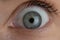 Close up beautiful blue eye opening human iris macro natural beauty