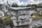 Close-up of a beautiful Corinthian column located and preserved among the ruins in the Ancient Agora in Athens, Greece