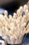 Close up beautiful creamy colour dried grass in flower vase for decoration in home and hotel event