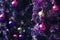 Close up beautiful decorated purple Christmas tree by colorful bauble ball
