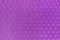Close-up beautiful geometric purple hexagonal texture. Purple soft playing mat honeycomb textured details