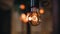 Close-up of a beautiful incandescent lamp. The stunning decor of the room