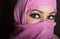 Close-up beautiful mysterious eyes eastern woman wearing a hijab