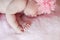 Close-up beautiful sleeping baby girl. Newborn baby girl with fl