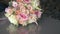 Close-up of a beautiful wedding bouquet on the table. Congratulations on Valentine`s Day. Flower shop. Delivery of roses, selectiv