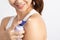 Close up beautiful woman with cream lotion apply on her shoulder feeling so happiness