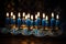 Close-up of a beautifully lit Hanukkah menorah. Hanukkah decoration with candles