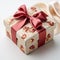 A close-up of a beautifully wrapped gift box adorned with bows and ribbons.