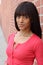 Close up beauty portrait of a young and attractive African American black woman with perfect skin, with toothless smile