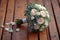 Close up beauty rustic wedding bouquet with creamy roses and carnations