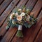 Close up beauty rustic wedding bouquet with creamy roses and carnations
