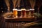 close-up of beer flight on rustic wooden table