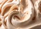 Close up of beige ice-cream.