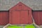 Close up of a big red barn with large double doors in Chaddsforge Pa.