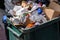 close-up of bin overflowing with recyclables, representing the abundance and value of recycling