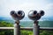 close-up of binoculars on observation deck