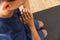 Close up of biracial man doing yoga and meditating at home