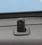 The close up of black car door lock indicator.