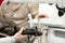 Close up black dog paws. Dog lying on table in pet clinic during ultrasonic exam