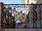 Close-up of black and gold wrought iron fence.