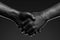 Close up of black hands handshake on dark background . 3d rendering. reconciliation