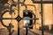 Close-up of the black metal grille at the main entrance of the Municipal Cemetery of Porreres