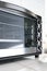 Close up of black mini electric oven home appliance