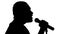 Close-up of a black silhouette of a microphone and