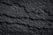 Close up  black slate stone texture with detail patterns for background