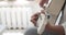 Close up black woman playing the guitar and enjoying a quiet time at home.