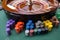 A close up of a blackjack dealer's hands in a casino, very shallow depth of field.