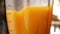 Close up of blended tropical mango in a blender. Sweet mango fruit with milk blended up to the healthy mango smoothie. Healthy eat