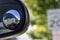 Close up of a blind spot mirror on the passenger side