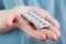 Close up of a blister of pills in the palm of a young caucasian woman