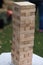 Close up blocks wood game. Jenga game. Wooden blocks. Strategy game. Classic family entertainment