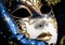 Close up of a blue with gold elegant traditional venetian mask