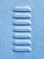 Close-up Blue Grainy Painted Sheet Metal Louvers Pattern