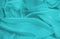 Close up on blue green material background or texture